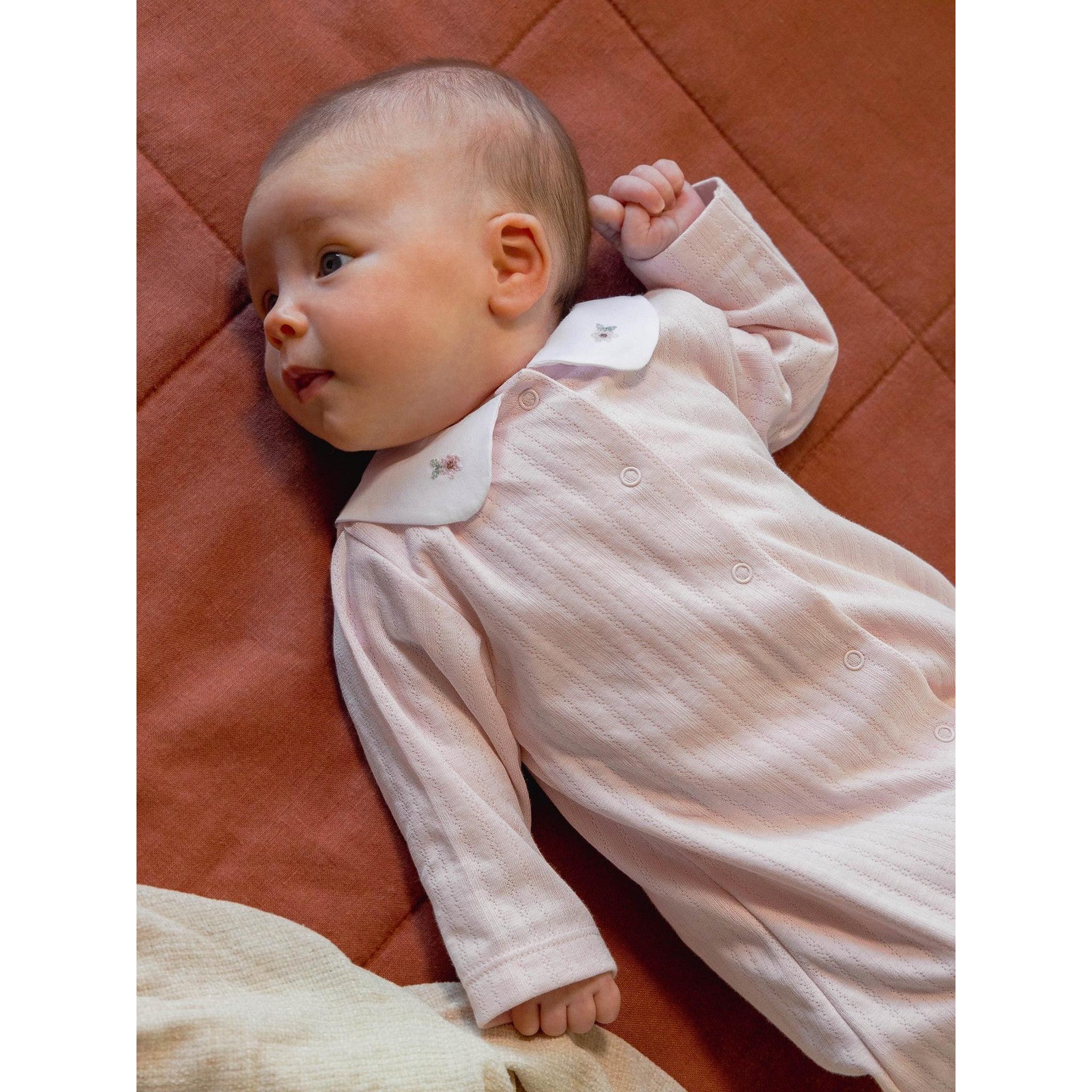 Babygrow in organic cotton with embroidered flowers