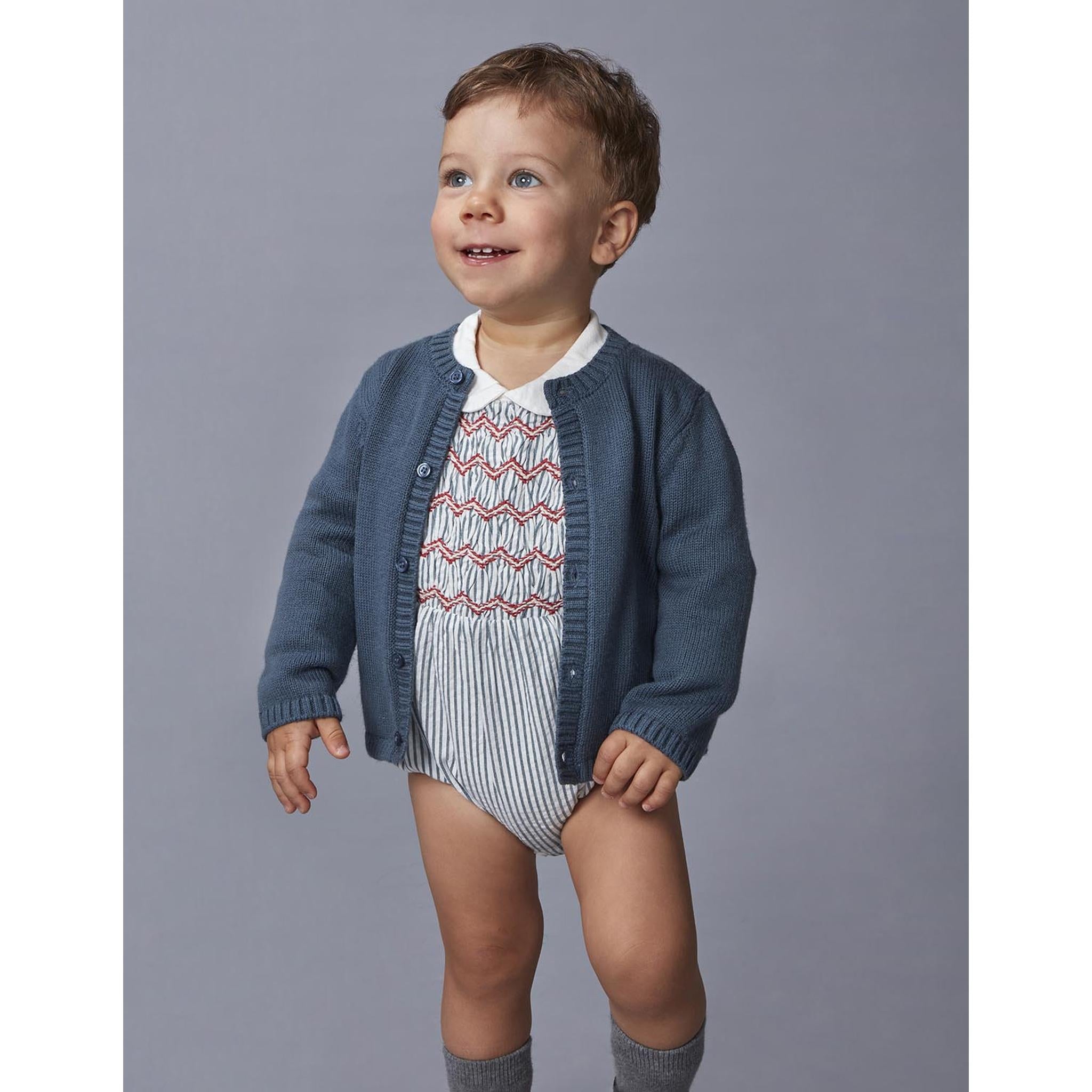 Ranita de rayas con smock azul claro